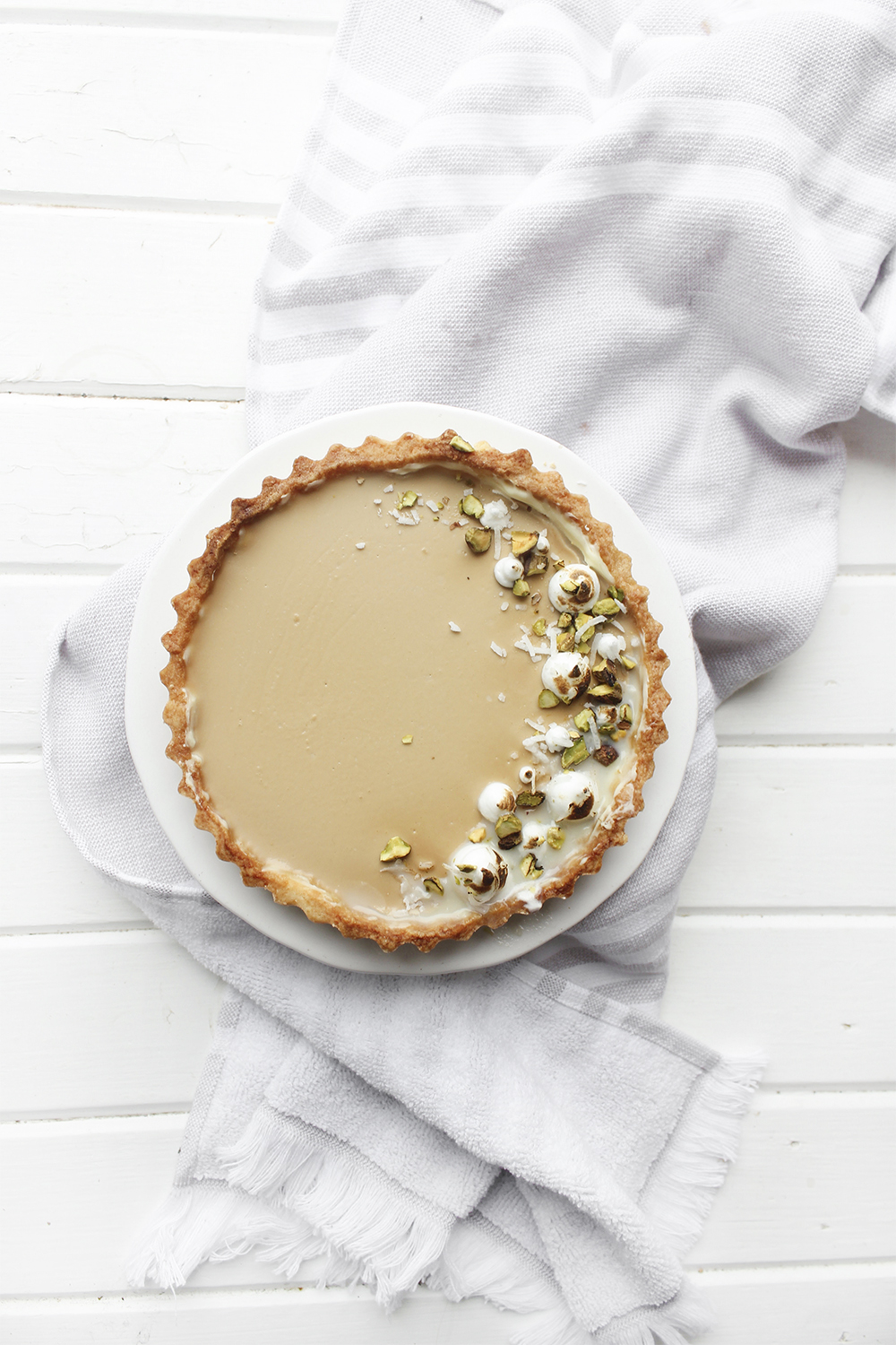 Earl Grey Panna Cotta Tart - smooth and creamy earl grey infused panna cotta set into a pate sucree crust brushed with white chocolate #tart #pannacotta #dessert #baking #earlgrey #tartrecipe #tea #earlgreytea #easydessert #simpledessert