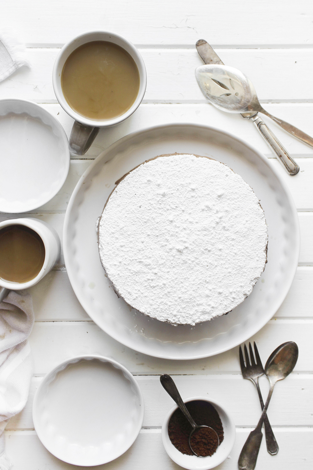 Mocha Almond Meringue Cake - Rich mocha almond mousse sandwiched between two layers of crisp almond meringue making a sweet coffee flavoured dessert #mocha #meringuecake #meringue #chocolate #dessert #baking #simplebaking #meringuesandwich 