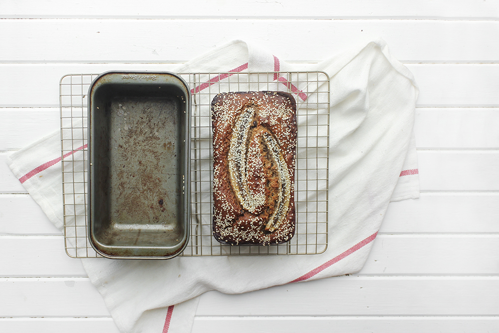 Tahini, Pecan, Chocolate Banana Bread - Make this banana bread recipe if you wish to up your banana bread game! Adding tahini, dark chocolate and pecans adds so much more flavour and crunch #bananabread #banana #tahini #baking #snack #quickbread #ripebananas