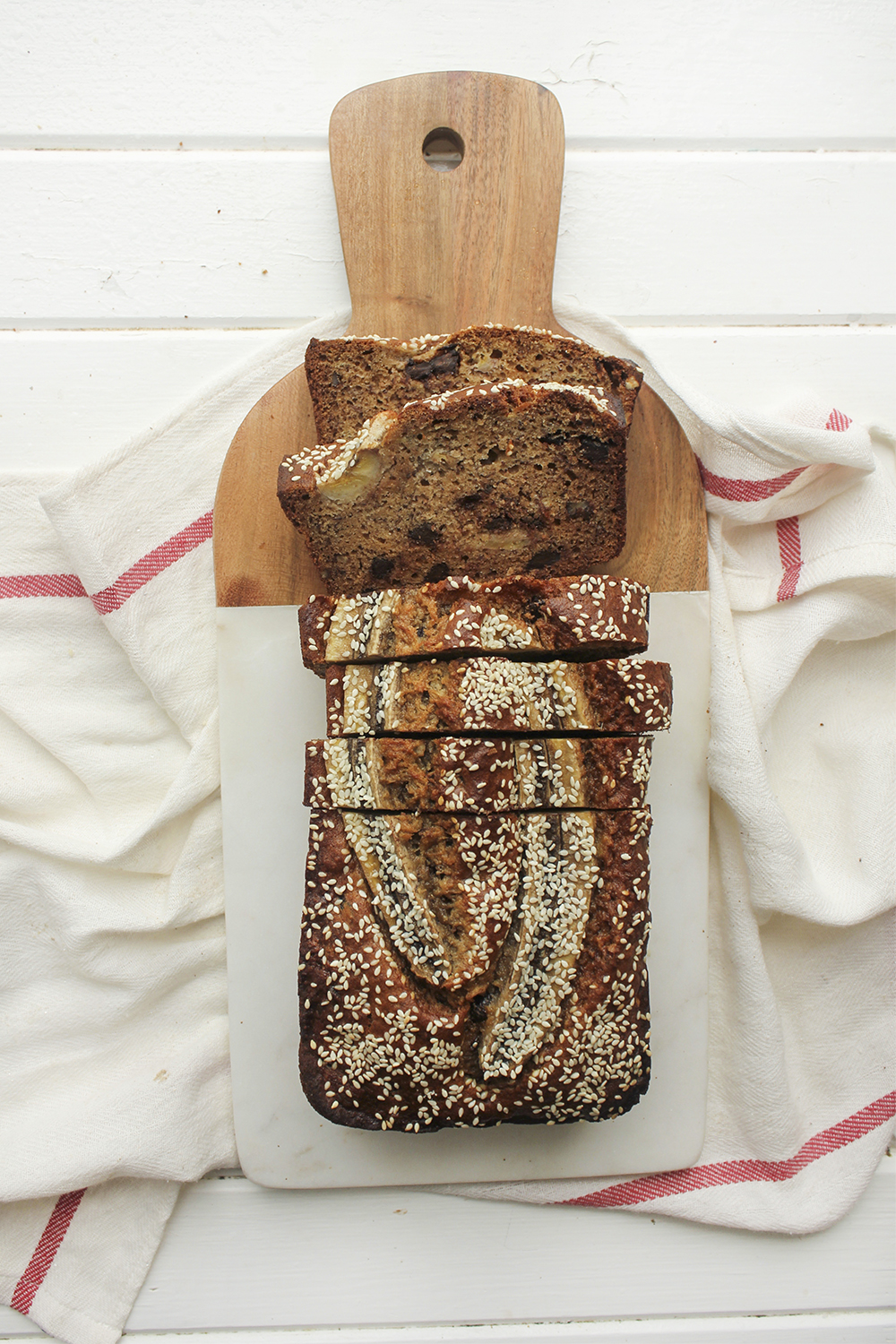 Tahini, Pecan, Chocolate Banana Bread - Make this banana bread recipe if you wish to up your banana bread game! Adding tahini, dark chocolate and pecans adds so much more flavour and crunch #bananabread #banana #tahini #baking #snack #quickbread #ripebananas