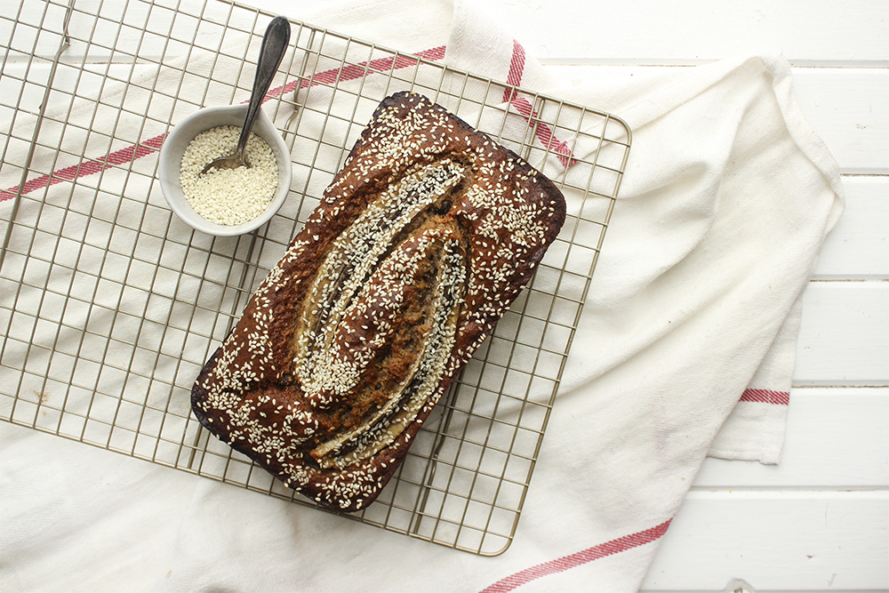 Tahini, Pecan, Chocolate Banana Bread - Make this banana bread recipe if you wish to up your banana bread game! Adding tahini, dark chocolate and pecans adds so much more flavour and crunch #bananabread #banana #tahini #baking #snack #quickbread #ripebananas