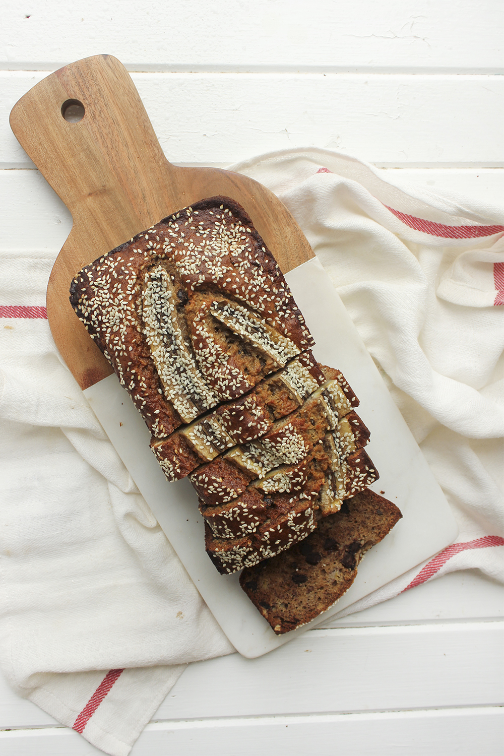 Tahini, Pecan, Chocolate Banana Bread - Make this banana bread recipe if you wish to up your banana bread game! Adding tahini, dark chocolate and pecans adds so much more flavour and crunch #bananabread #banana #tahini #baking #snack #quickbread #ripebananas