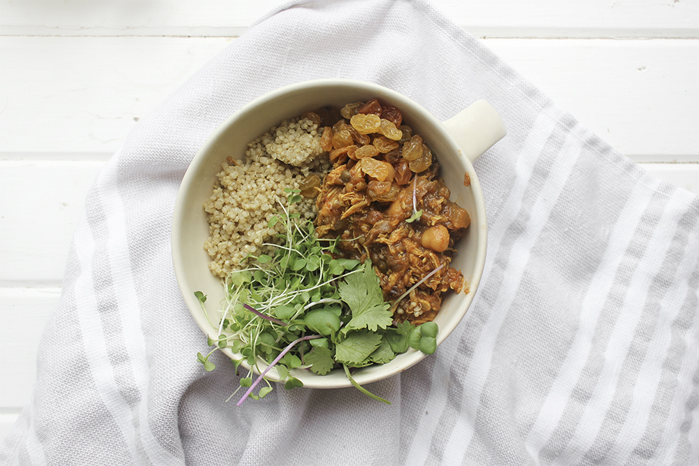 Moroccan Chicken Chickpea Stew - A flavourful one pot meal that everyone in your family will enjoy. Serve Moroccan Chickpea Stew with raisins, greens, yogurt, sliced almonds and quinoa. #onepotmeal #slowcooker #moroccan #chickpea #spices #easydinner #quinoa #vegetarianoption #stew