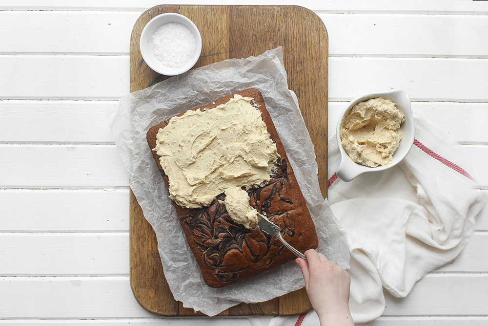 Browned Butter Banana Cake with Peanut Buttercream - Make this cake to bring back your favourite flavour combination of your youth. A combo of banana and peanut butter buttercream makes a moist flavourful cake. #banana #peanutbuttercream #peanutbutter #bananacake #sheetcake #easydessert #simpledessert #weeknightdessert #onepancake #onepandessert #onepan