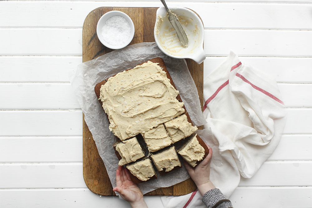 Browned Butter Banana Cake with Peanut Buttercream - Make this cake to bring back your favourite flavour combination of your youth. A combo of banana and peanut butter buttercream makes a moist flavourful cake. #banana #peanutbuttercream #peanutbutter #bananacake #sheetcake #easydessert #simpledessert #weeknightdessert #onepancake #onepandessert #onepan