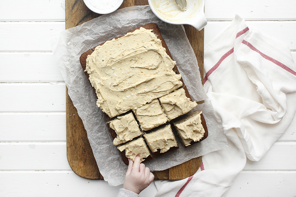 Browned Butter Banana Cake with Peanut Buttercream - Make this cake to bring back your favourite flavour combination of your youth. A combo of banana and peanut butter buttercream makes a moist flavourful cake. #banana #peanutbuttercream #peanutbutter #bananacake #sheetcake #easydessert #simpledessert #weeknightdessert #onepancake #onepandessert #onepan