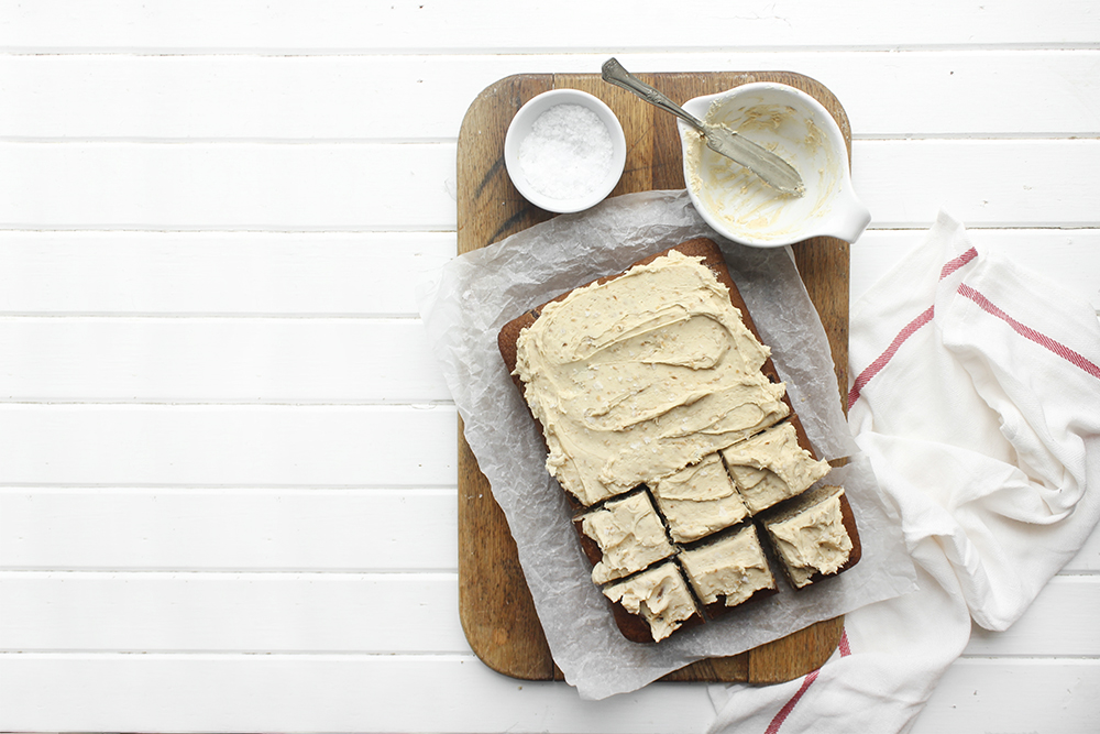 Browned Butter Banana Cake with Peanut Buttercream - Make this cake to bring back your favourite flavour combination of your youth. A combo of banana and peanut butter buttercream makes a moist flavourful cake. #banana #peanutbuttercream #peanutbutter #bananacake #sheetcake #easydessert #simpledessert #weeknightdessert #onepancake #onepandessert #onepan