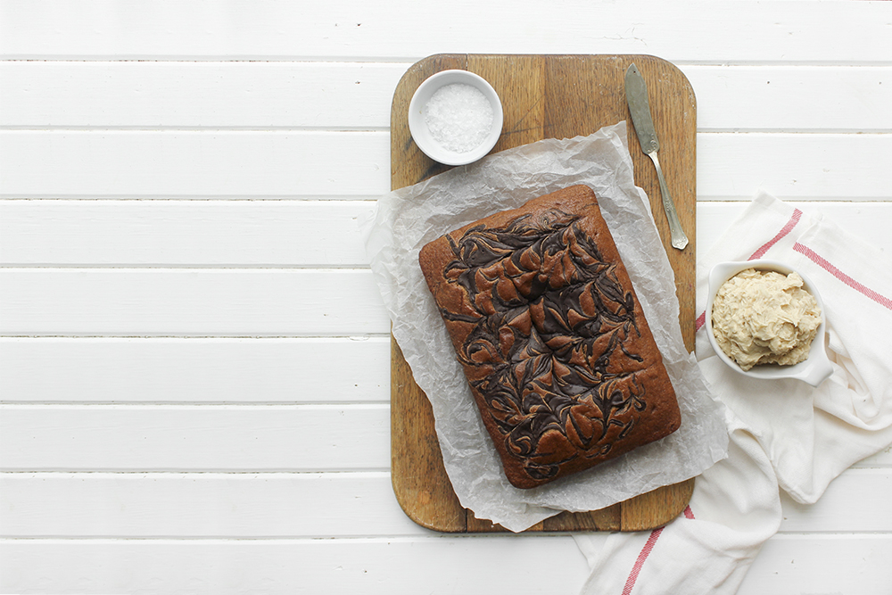 Browned Butter Banana Cake with Peanut Buttercream - Make this cake to bring back your favourite flavour combination of your youth. A combo of banana and peanut butter buttercream makes a moist flavourful cake. #banana #peanutbuttercream #peanutbutter #bananacake #sheetcake #easydessert #simpledessert #weeknightdessert #onepancake #onepandessert #onepan